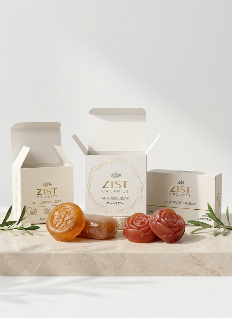 Zist Organics herbal soap collection with anti acne and anti dark spot soaps in premium skincare setup